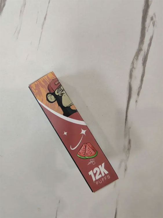 An e-cigarette, short for electronic cigarette, is a battery-powered device that simulates tobacco smoking by producing an aerosol, often mistaken for vapor, consisting of fine particles. It typically contains nicotine and can come in various flavors.